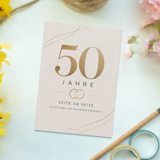 Elegante Postkarte zur Goldenen Hochzeit mit goldenen Ringen|p:2012558|h:932a968654928e0e48093e7e6f76291d