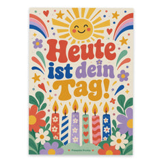 Fröhliche Grußkarte zum Geburtstag mit Kerzen und Konfetti