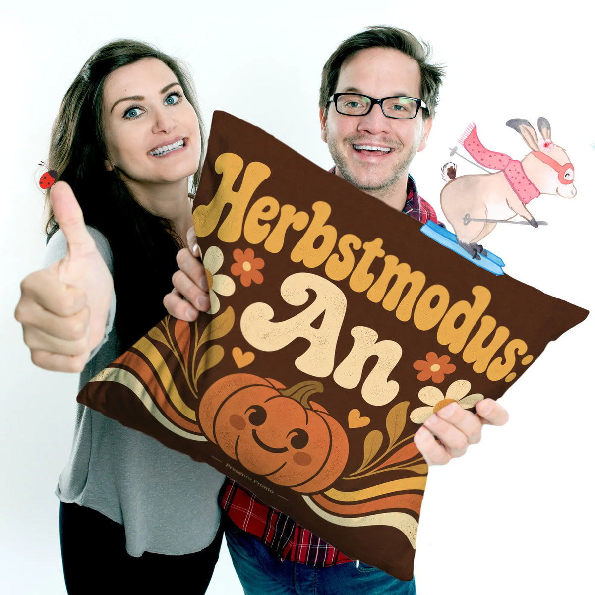 Gemütliches Kissen für den Herbst mit lächelndem Kürbis|p:2013909|h:2df3fb9e3a210a33c4670aafd096d309
