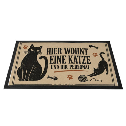 Lustige Fußmatte für Katzenbesitzer mit sitzender Katze|p:2014322|h:e1d8d19852b3b60221a233ac0fb66762