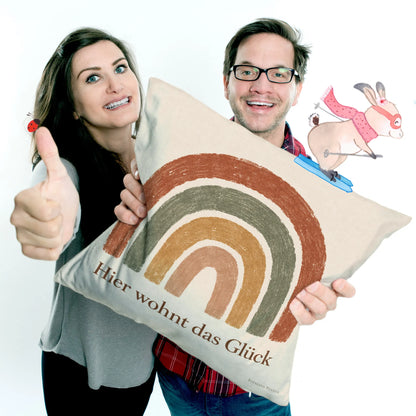 Gemütliches Dekokissen mit Regenbogen fürs neue Zuhause|p:2014601|h:93ae20386925c1dcbb584403c4c08d4a