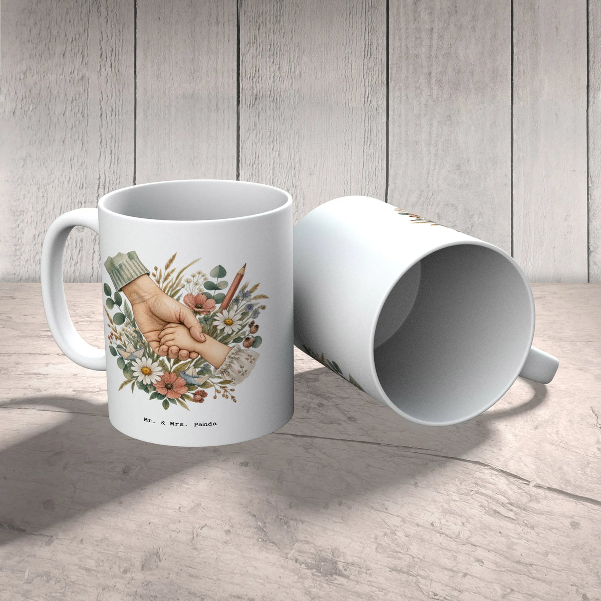Herzliche Tasse für Erzieher mit Händen und Wildblumen|p:2014908|h:6cfe318df9548ccb69aa8ffd1c3bb600