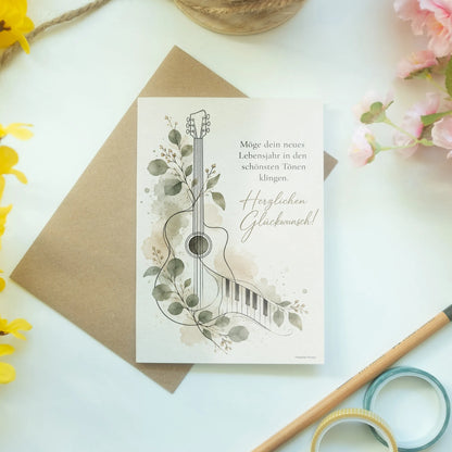 Elegante Geburtstagskarte für Musikliebhaber mit Gitarre|p:2016697|h:6cbca0bfcce0fa713c9090b4c3b7db9e