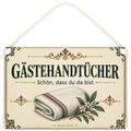 Herzliches Schild für Gästehandtücher mit gefaltetem Handtuch
