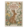 Fröhliche Osterpostkarte mit Hase zwischen Frühlingsblumen