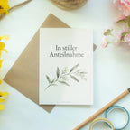 Würdevolle Trauerkarte mit Olivzweig|p:2019044|h:6083c4068fc0566f0fa3c00c6b8de724