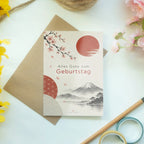 Elegante Japanische Geburtstagskarte mit roter Sonne und Sakura|p:2020429|h:e60b0591592f156f95d7661b41fe72b0