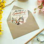 Herzliche Grußkarte mit Katze zwischen Blumen zum Geburtstag|p:2020759|h:01d994ffad79bc979b16f8683825fa7c