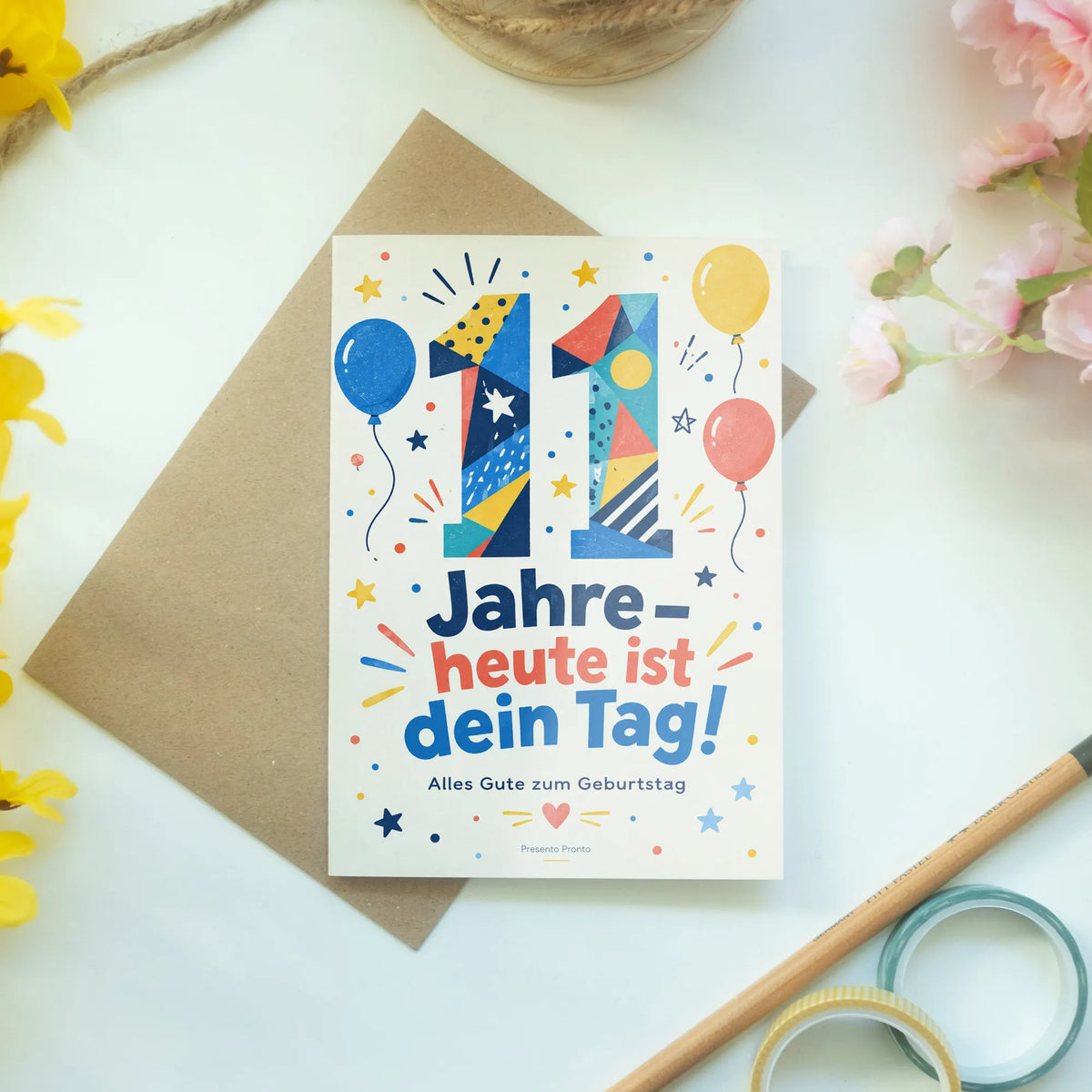 Fröhliche Geburtstagskarte zum 11. Geburtstag mit bunter Zahl 11