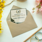 Elegante Glückwunschkarte für Golfer mit Fahne und Lorbeerkranz|p:2021329|h:d5d10b3a8bbed17a70106b13a2babcef
