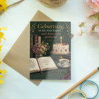 Elegante Geburtstagskarte für Leser mit aufgeschlagenem Buch|p:2021713|h:11b747f1d91a28c99854078c924b5b1f