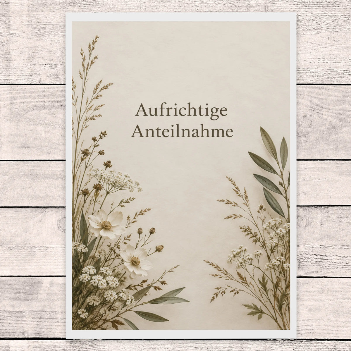 Würdevolle Trauerkarte mit aufrichtiger Anteilnahme und Blumenkranz