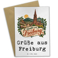 Herzliche Grußkarte aus Freiburg mit Münster Silhouette
