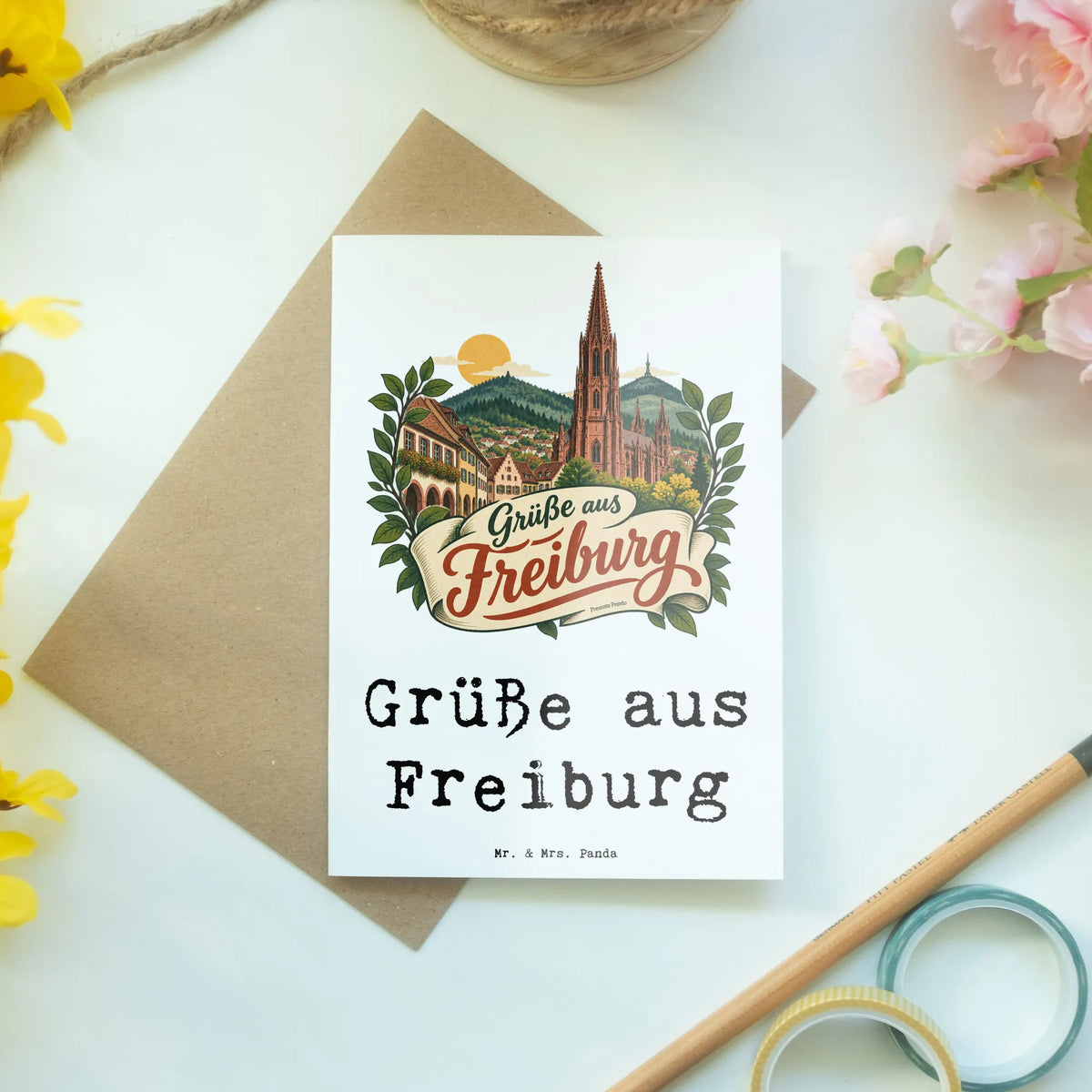 Herzliche Grußkarte aus Freiburg mit Münster Silhouette