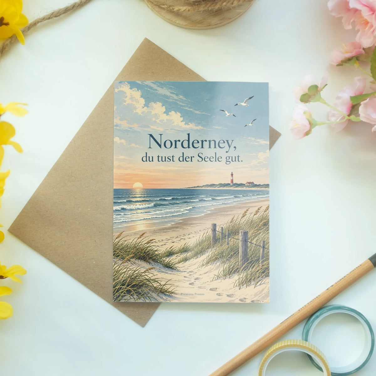 Herzliche Grußkarte von Norderney mit Leuchtturm