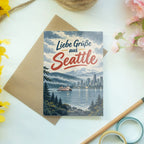 Herzliche Grußkarte aus Seattle mit Bucht und Fähre|p:2023933|h:ed2f03a24beecbf544459b81582c1646