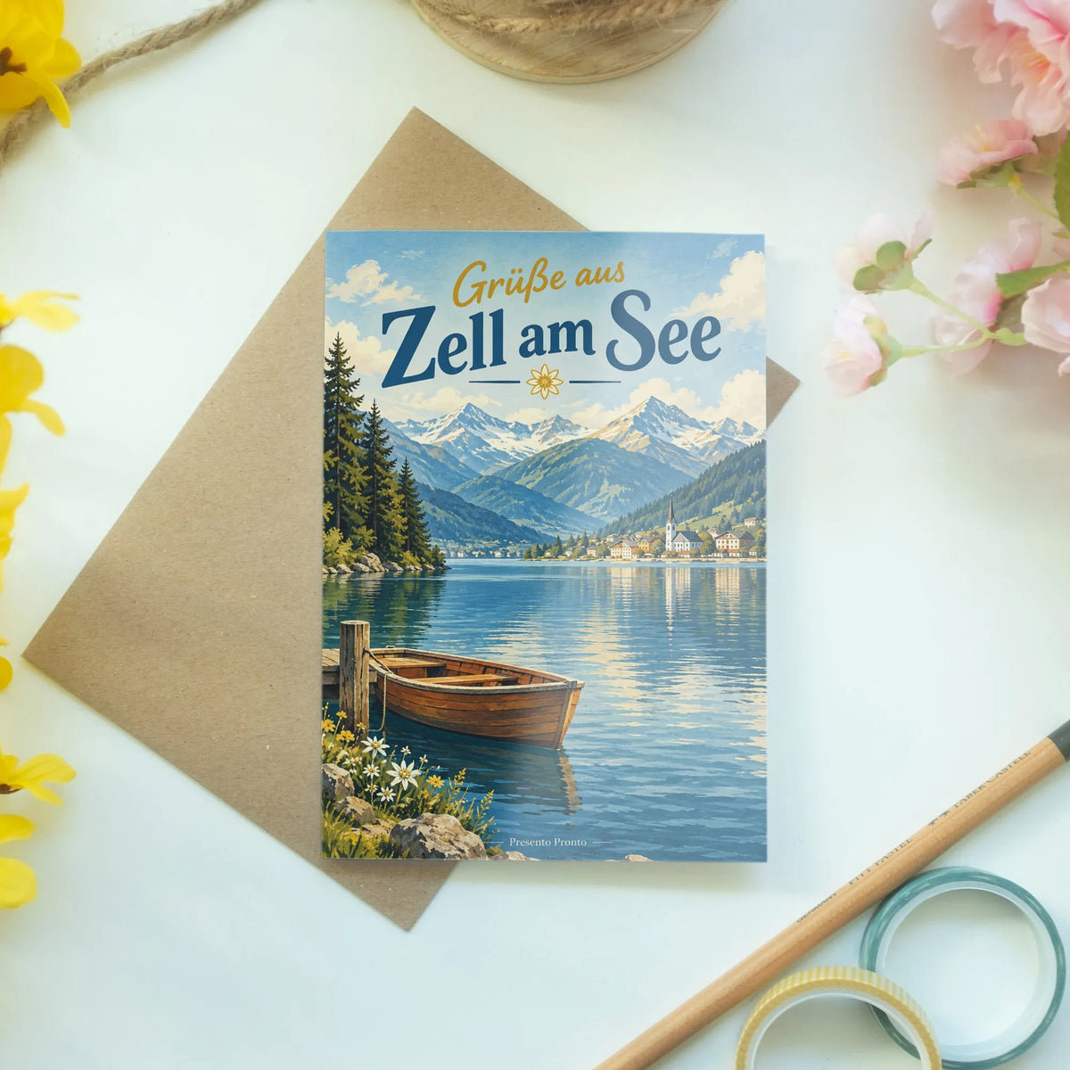 Herzliche Grußkarte aus Zell am See mit Alpensee und Boot